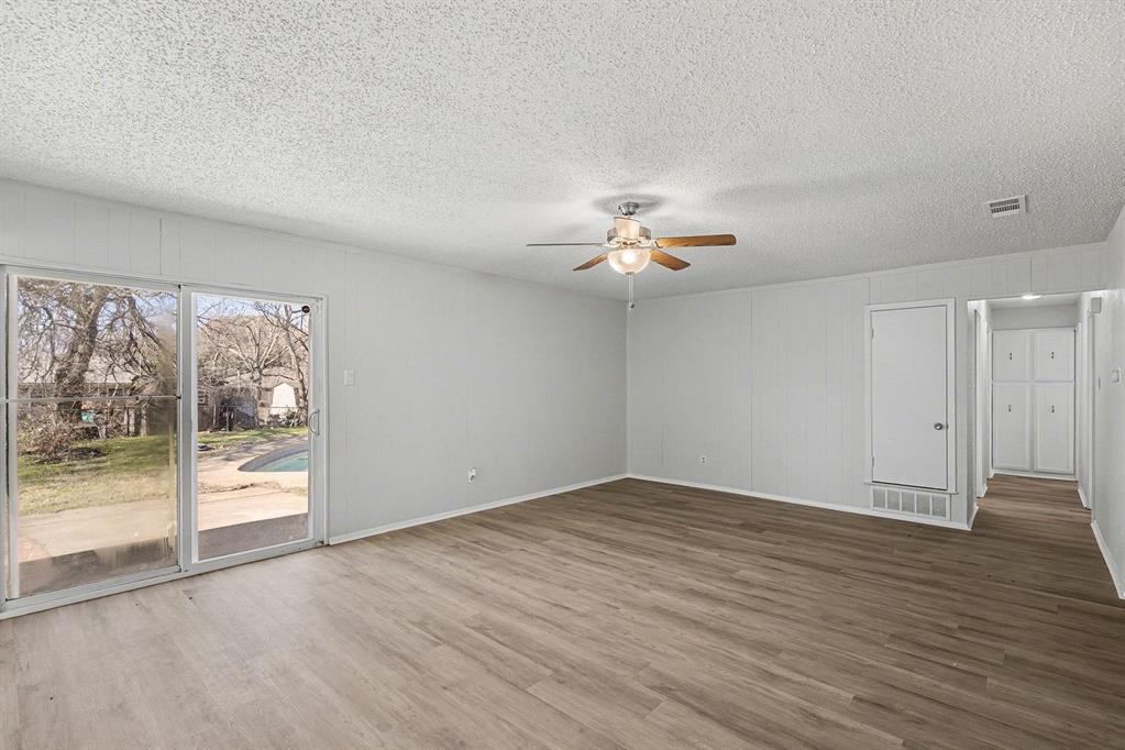 125 Roundtree Street Crowley, TX 76036 - Photo 5 of 25 a view of an empty room with a window