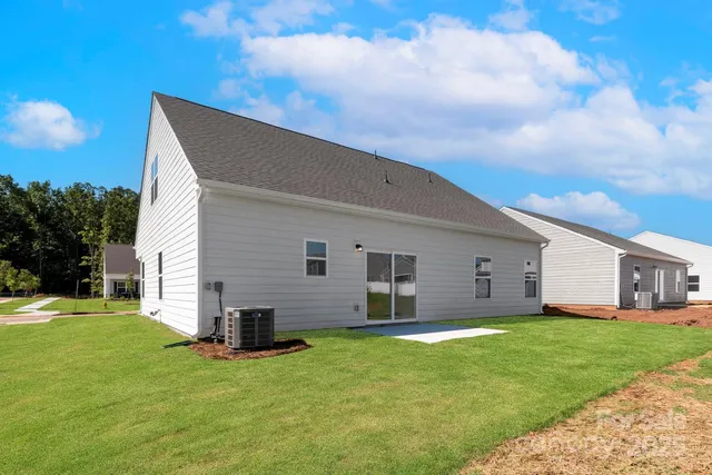 a front view of house with yard