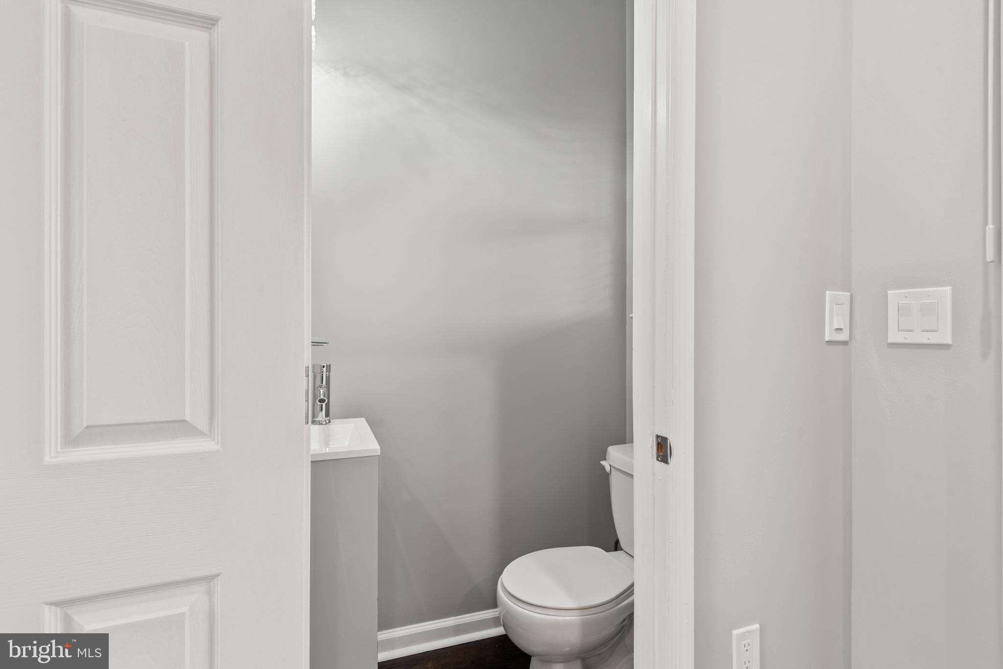 1410 Ramsay Street Baltimore, MD 21223 - Photo 7 of 23 Main Level Half Bathroom