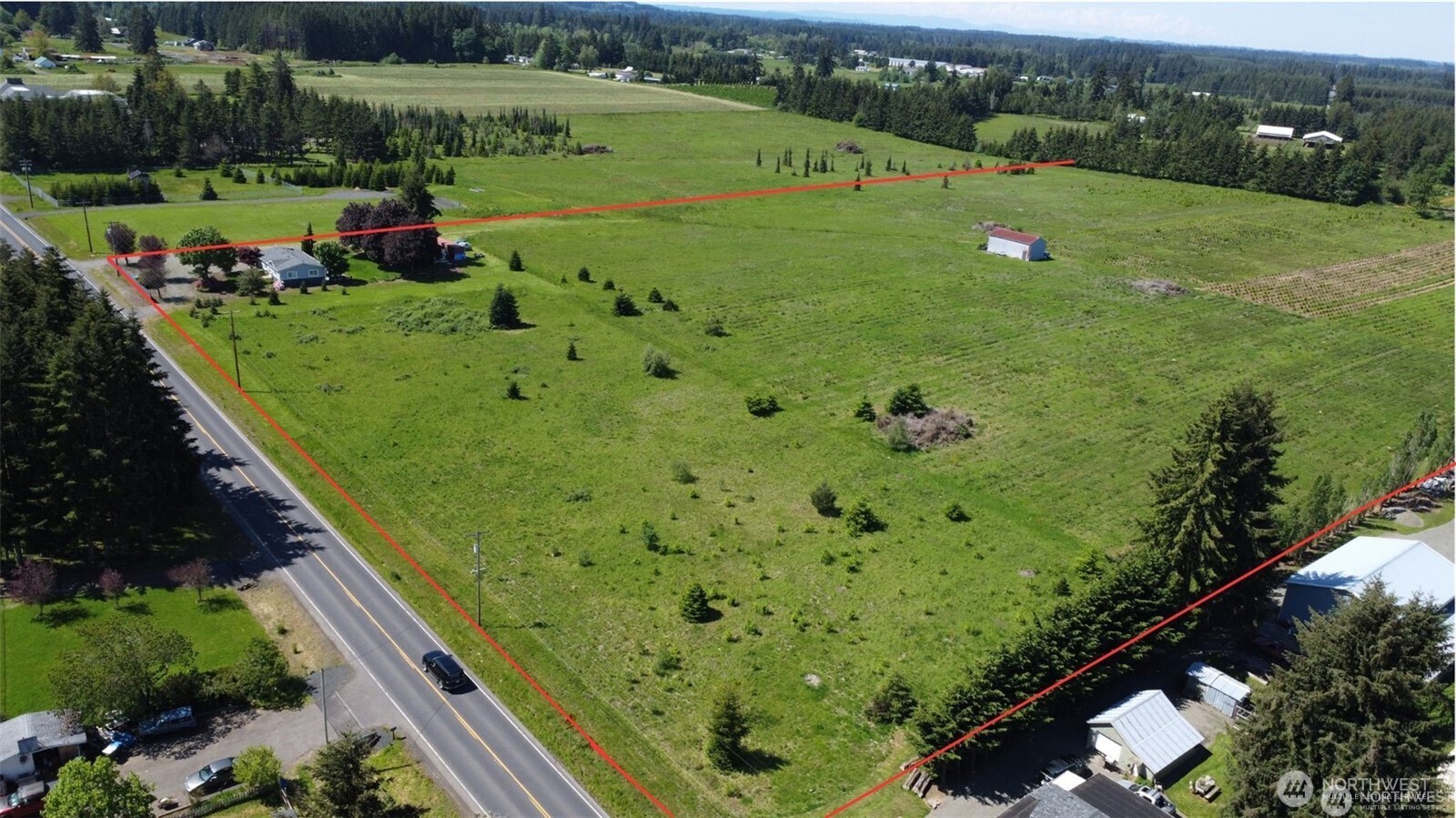 415 Highway 505 Winlock, WA 98596 - Photo 10 of 11 a view of a garden with an outdoor space