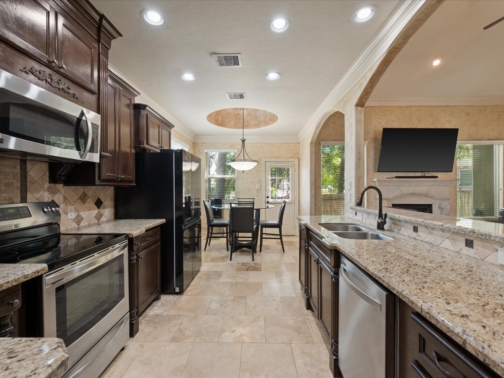 763-806 Lake View Drive Montgomery, TX 77356 - Photo 16 of 43 Breakfast Room features a round tray ceiling matching the Spanish Style design.