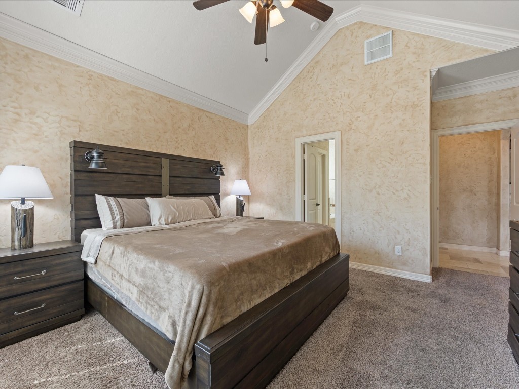 763-806 Lake View Drive Montgomery, TX 77356 - Photo 20 of 43 Primary Suite located downstairs with large windows, high ceilings, heavy crown molding