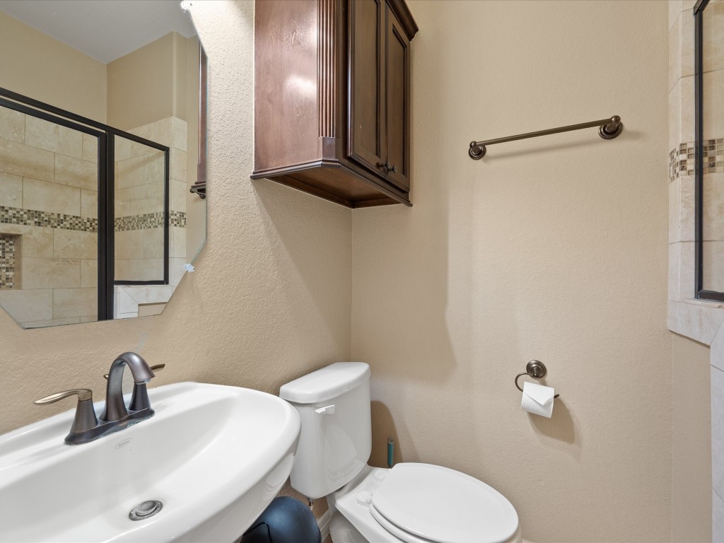 763-806 Lake View Drive Montgomery, TX 77356 - Photo 26 of 43 Headknocker cabinet above toilet for additional storage in Full Bathroom downstairs.