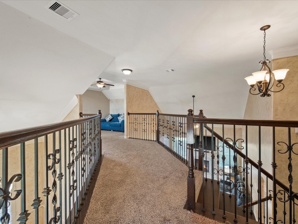 763-806 Lake View Drive Montgomery, TX 77356 - Photo 28 of 43 Upstairs loft with wrought-iron railing overlooks the Family Room & Entry below, leading to the perfect private flex space, study or lounge area.