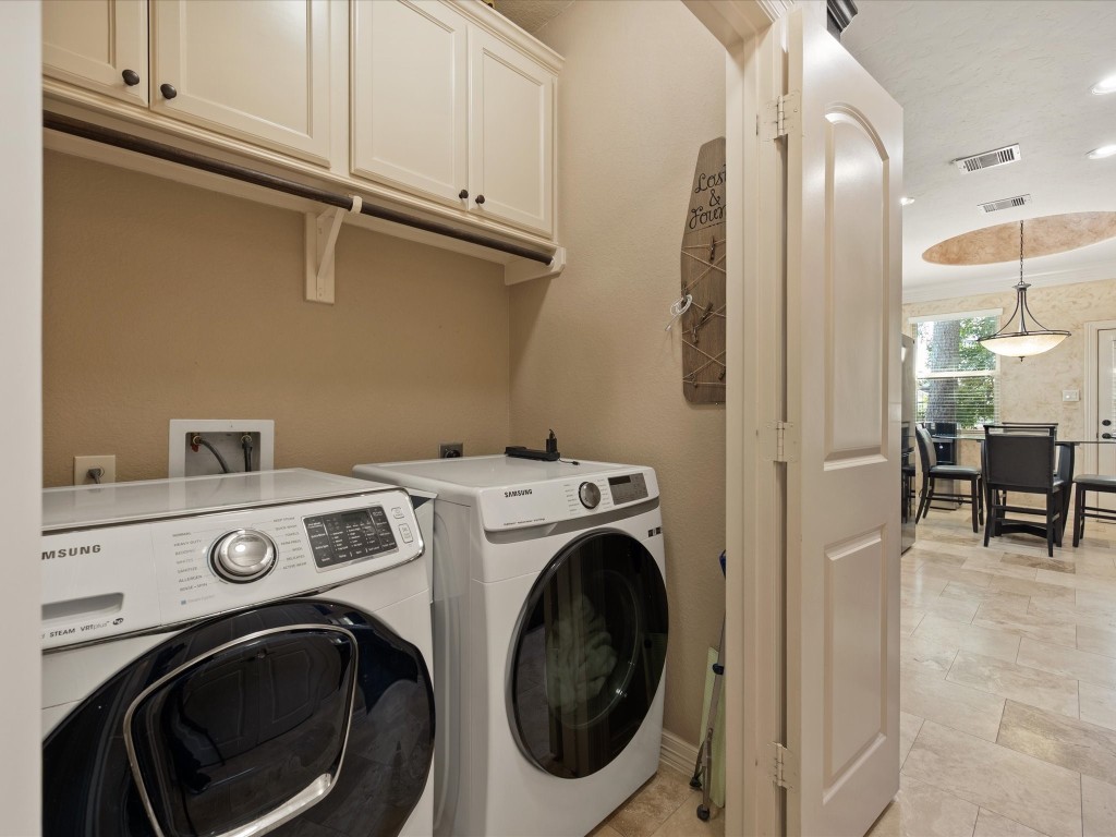 763-806 Lake View Drive Montgomery, TX 77356 - Photo 33 of 43 Utility Room is conveniently located downstairs with upper cabinetry for more storage.