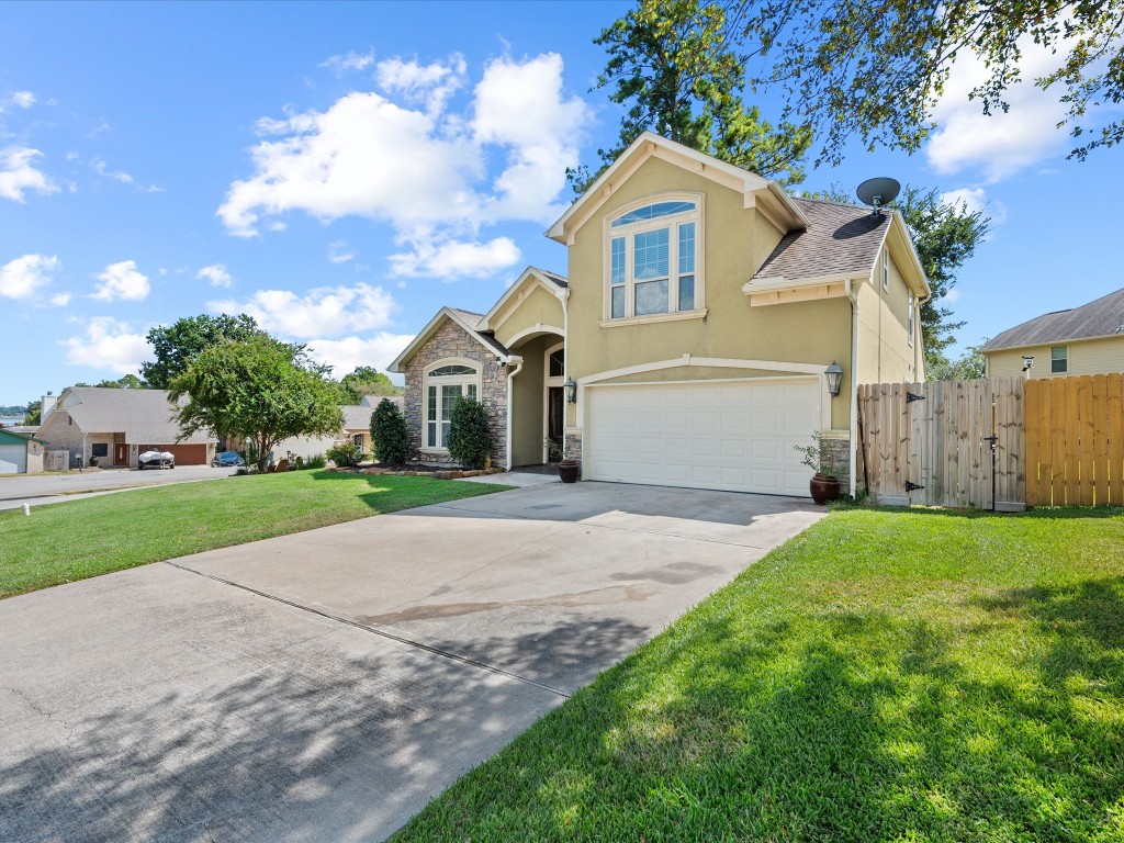 763-806 Lake View Drive Montgomery, TX 77356 - Photo 37 of 43 2-car garage with EPOXY FLOORING (2025) & extended driveway.