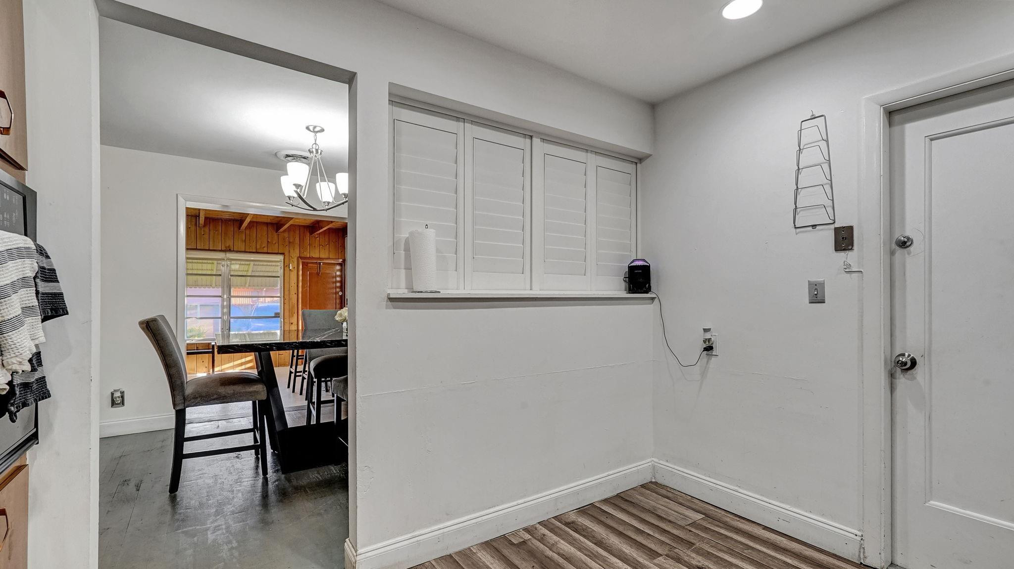 3410 Cleveland Street Hollywood, FL 33021 - Photo 13 of 63 a view of a livingroom with furniture and window