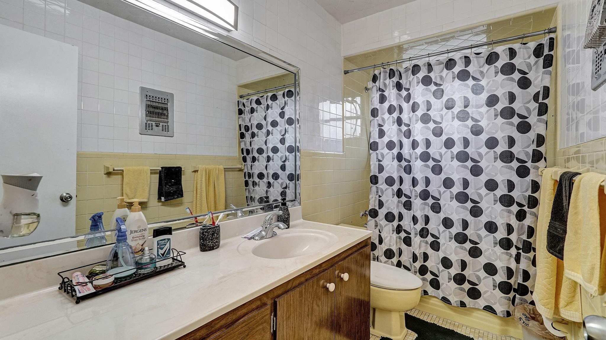 3410 Cleveland Street Hollywood, FL 33021 - Photo 21 of 63 a bathroom with a sink toilet and shower