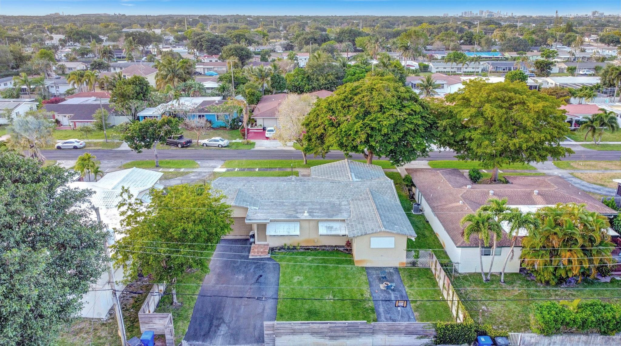 3410 Cleveland Street Hollywood, FL 33021 - Photo 3 of 63 an aerial view of a house with yard