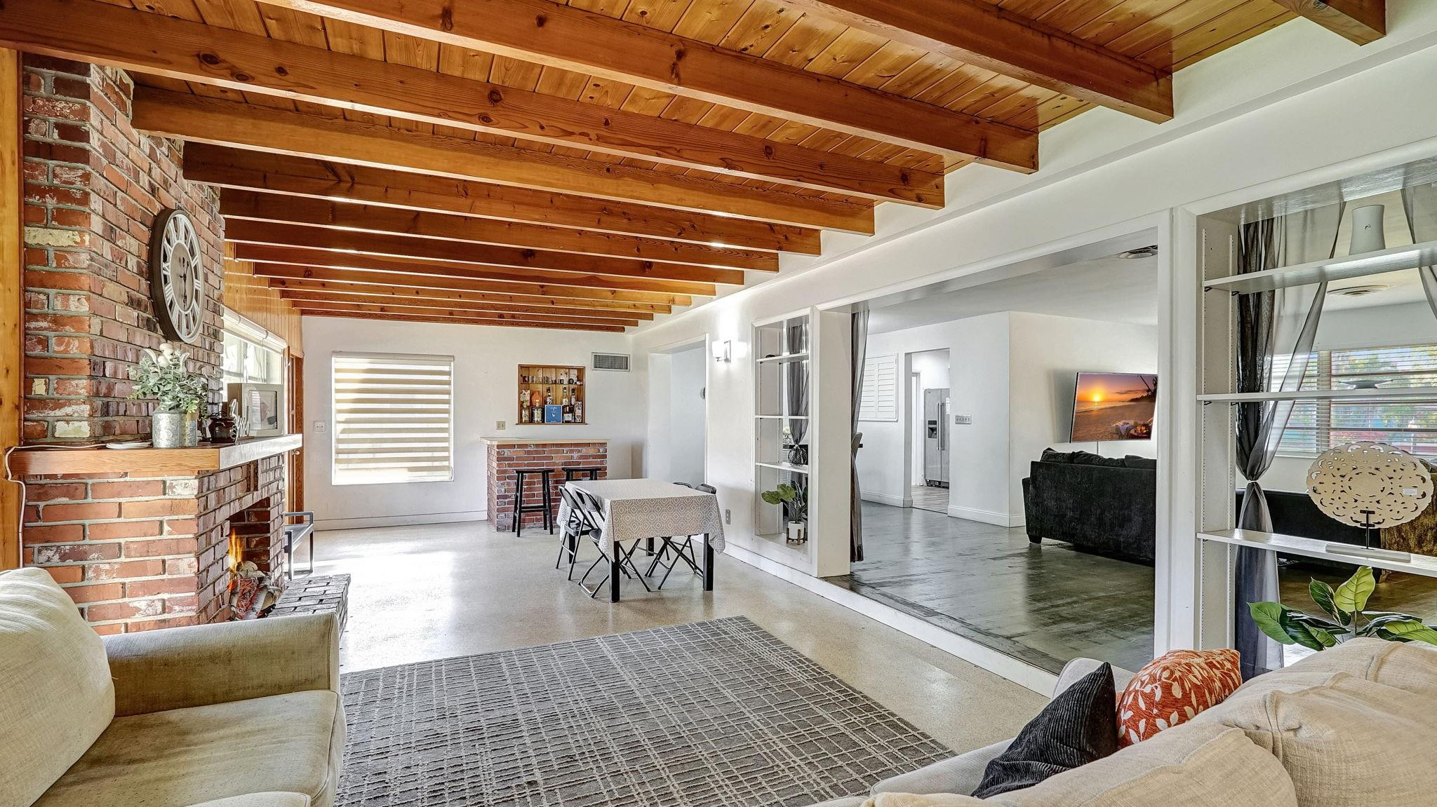 3410 Cleveland Street Hollywood, FL 33021 - Photo 42 of 63 a living room with furniture and a wooden floor