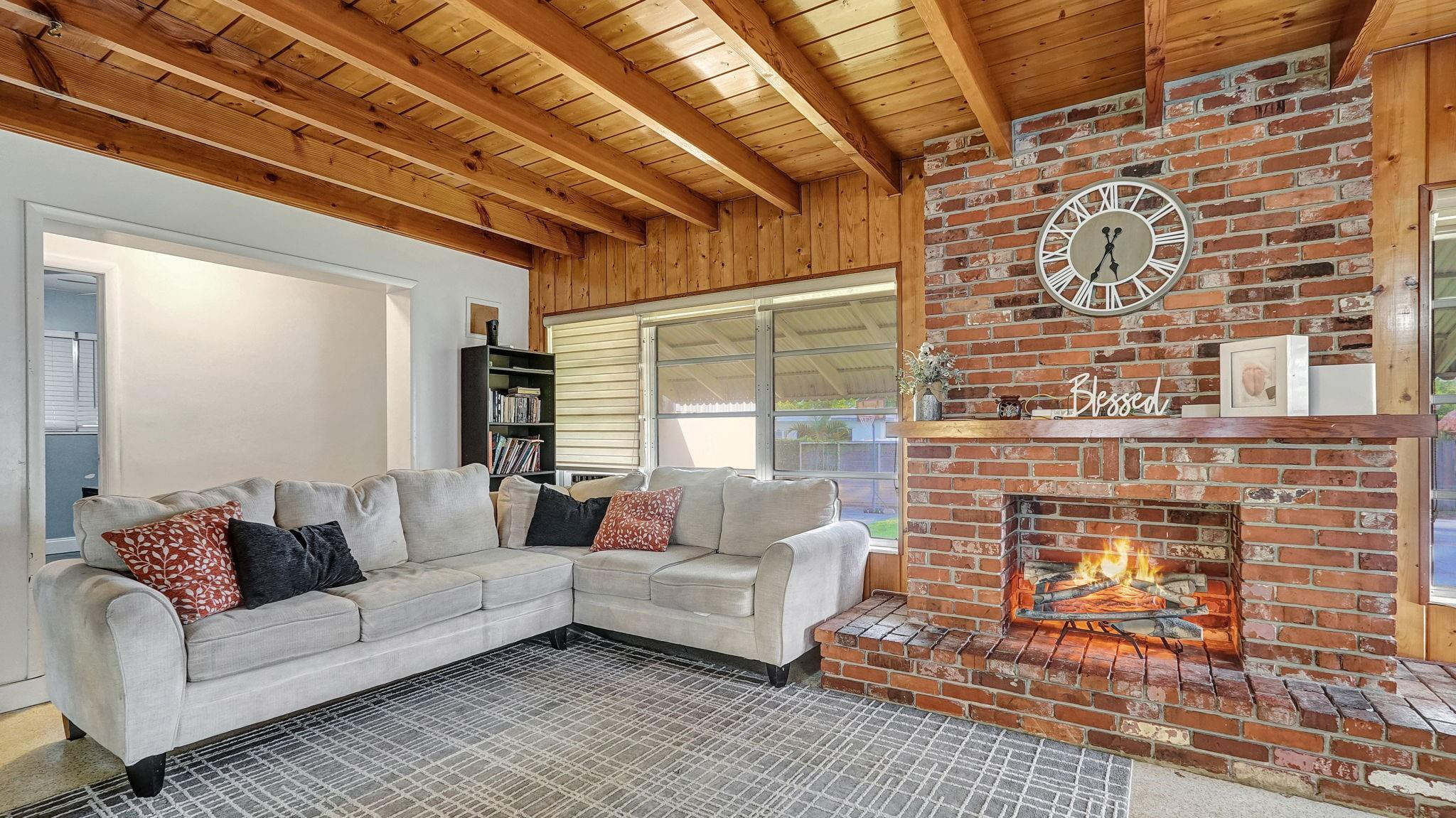 3410 Cleveland Street Hollywood, FL 33021 - Photo 43 of 63 a living room with furniture and a rug