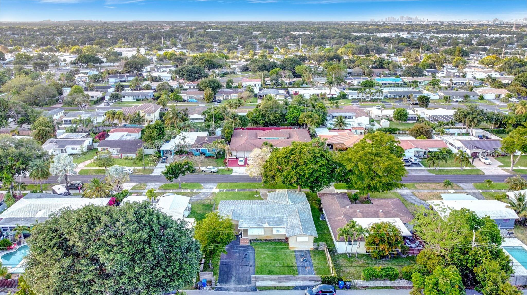 3410 Cleveland Street Hollywood, FL 33021 - Photo 46 of 63 an aerial view of residential houses with outdoor space and trees