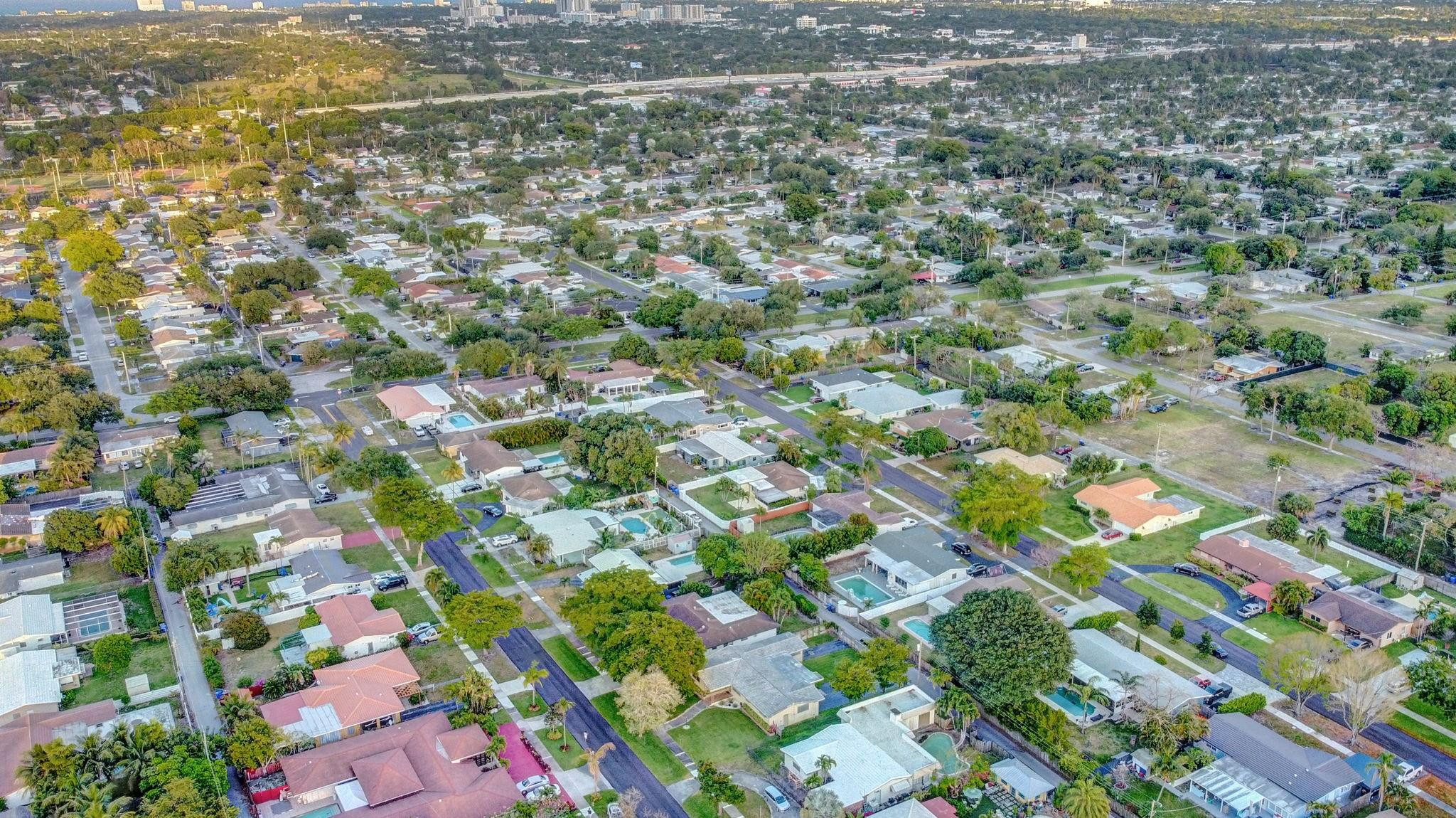 3410 Cleveland Street Hollywood, FL 33021 - Photo 56 of 63 an aerial view of residential houses with outdoor space