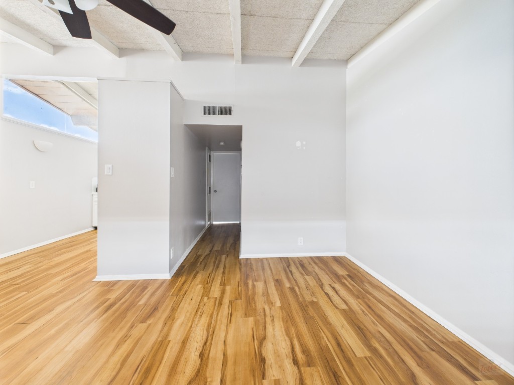 2404 Longview Street, Unit 206 Austin, TX 78705 - Photo 11 of 24 a view of a room with wooden floor