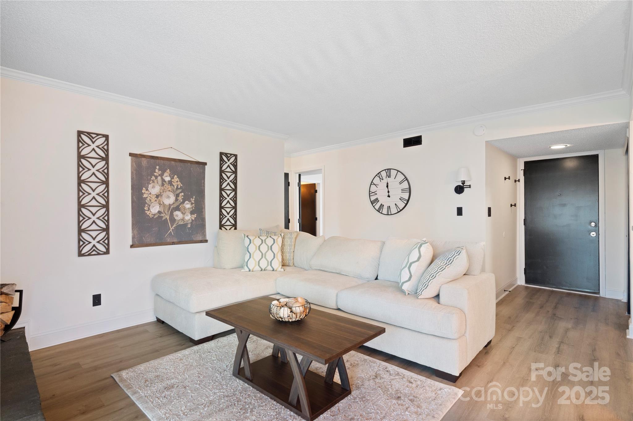 11123 Harrowfield Road Charlotte, NC 28226 - Photo 7 of 20 a living room with furniture and a table