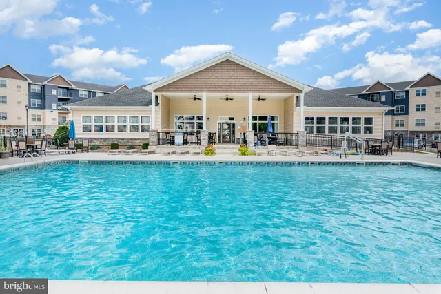 a front view of a building with garden