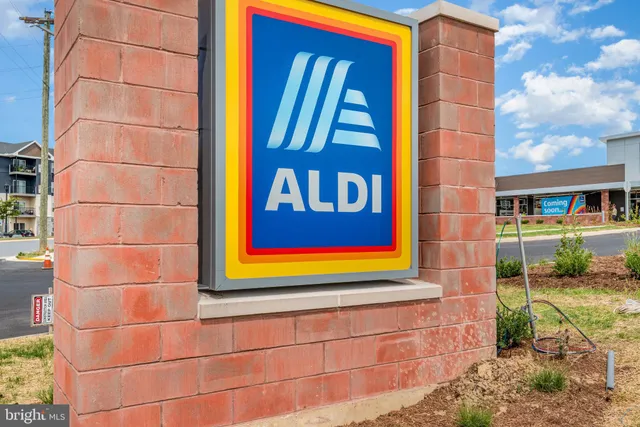 a view of a door with a door and wooden floor