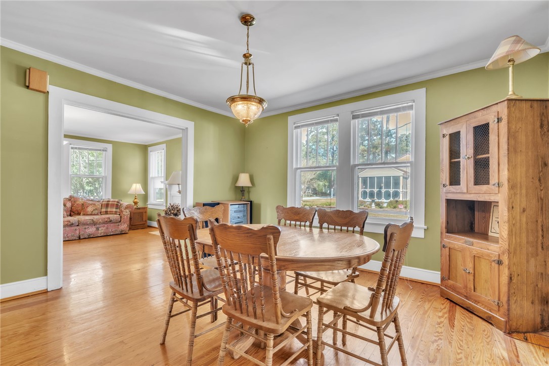 121 Ellison Street Belton, SC 29627 - Photo 8 of 30 This inviting dining area features ample natural light, ideal for everyday meals or entertaining.