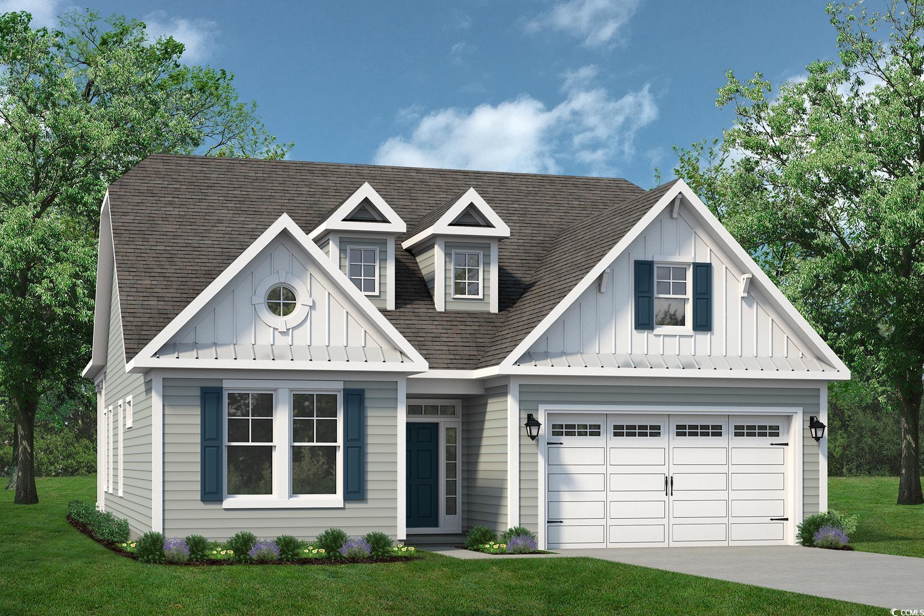 View of front of house with a shingled roof, a front lawn, and driveway