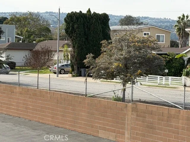 a view of a street with an outdoor space