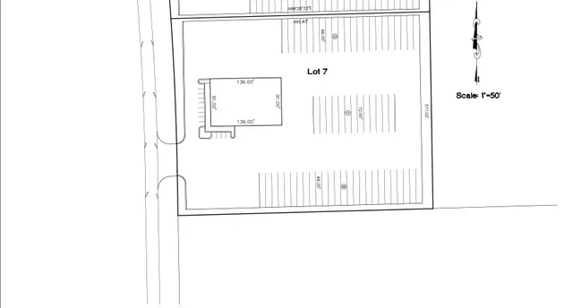 a black and white photo of a living room