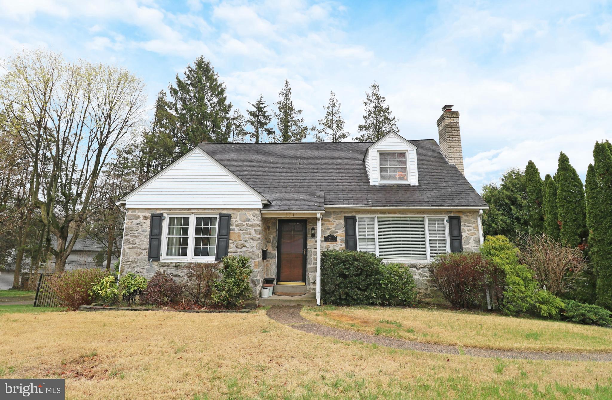 371 Southcroft Road Springfield, PA 19064 - Photo 1 of 42 a front view of a house with a yard