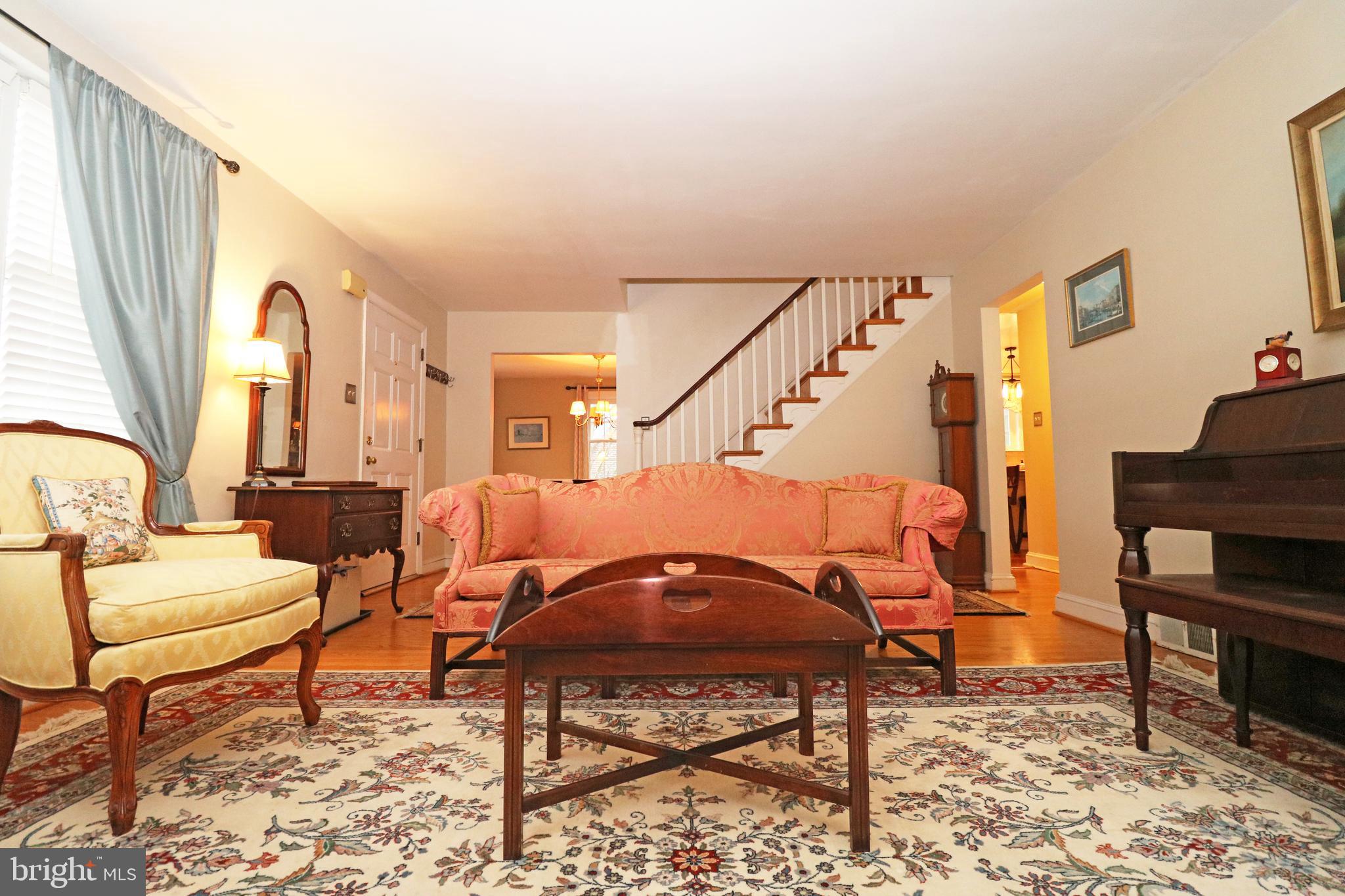 371 Southcroft Road Springfield, PA 19064 - Photo 2 of 42 a living room with furniture and wooden floor