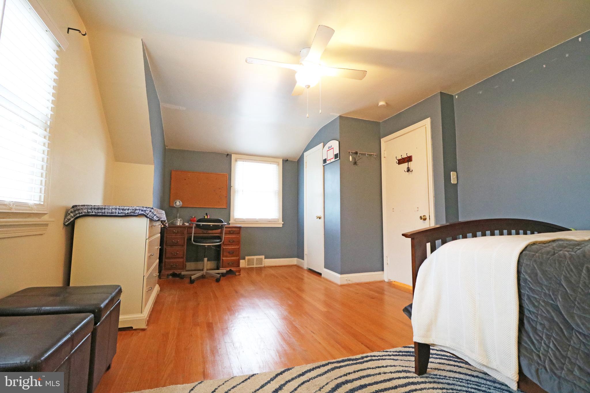 371 Southcroft Road Springfield, PA 19064 - Photo 29 of 42 a bed room with a bed and a chair