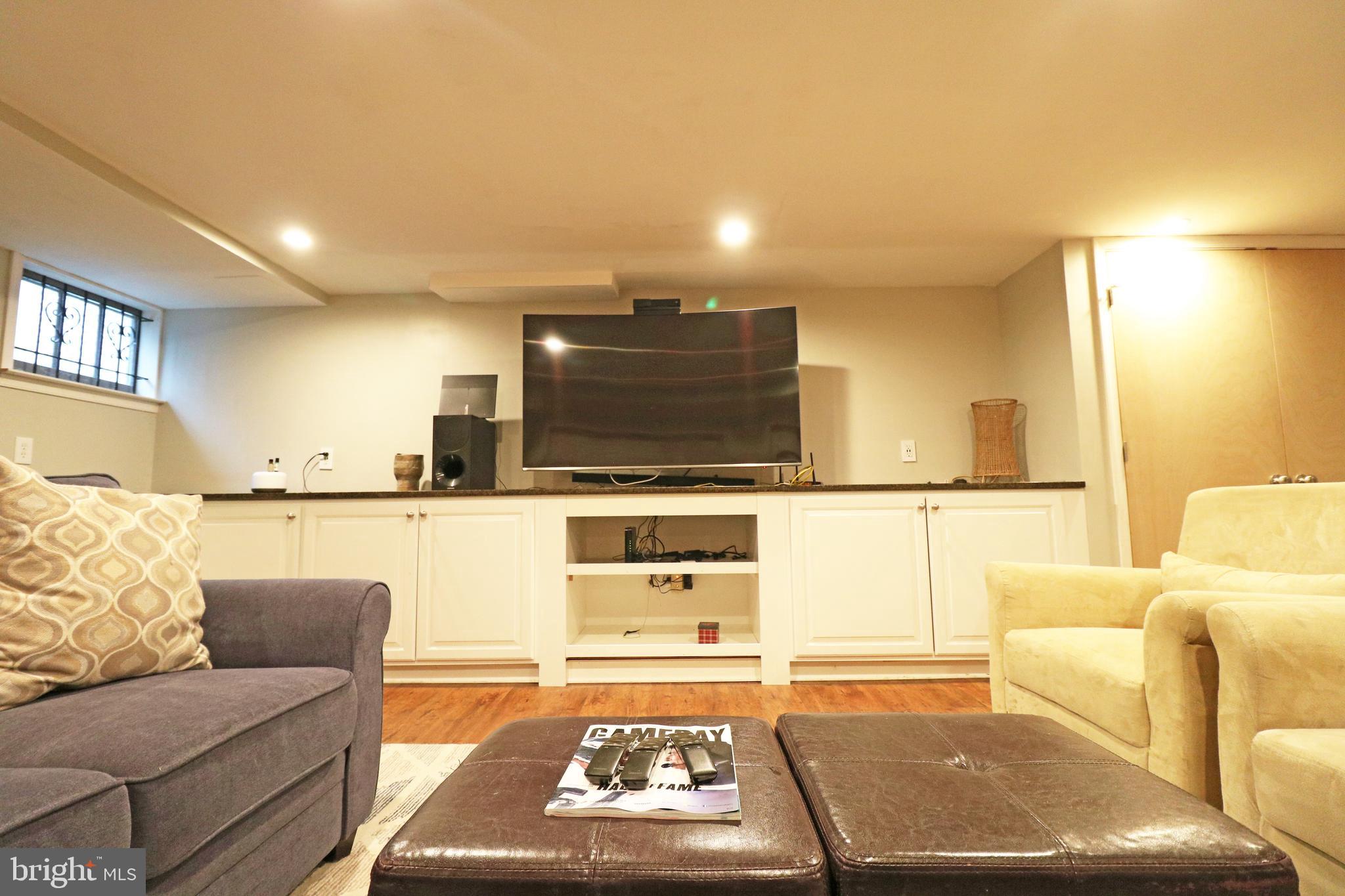 371 Southcroft Road Springfield, PA 19064 - Photo 31 of 42 a living room with furniture and a flat screen tv