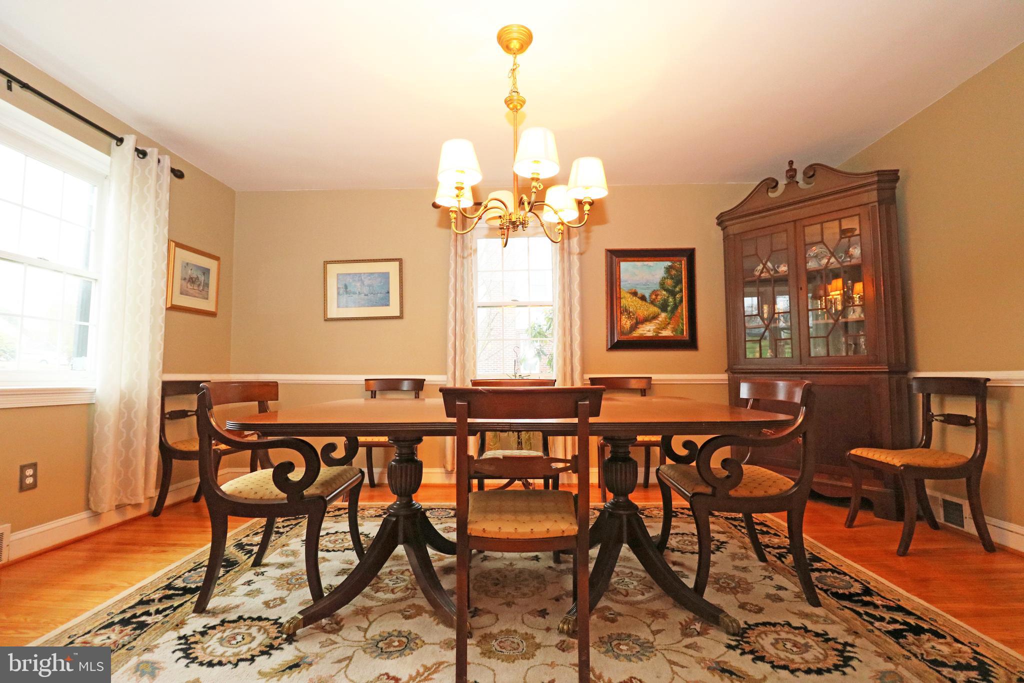371 Southcroft Road Springfield, PA 19064 - Photo 5 of 42 a view of a dining room with furniture and wooden floor
