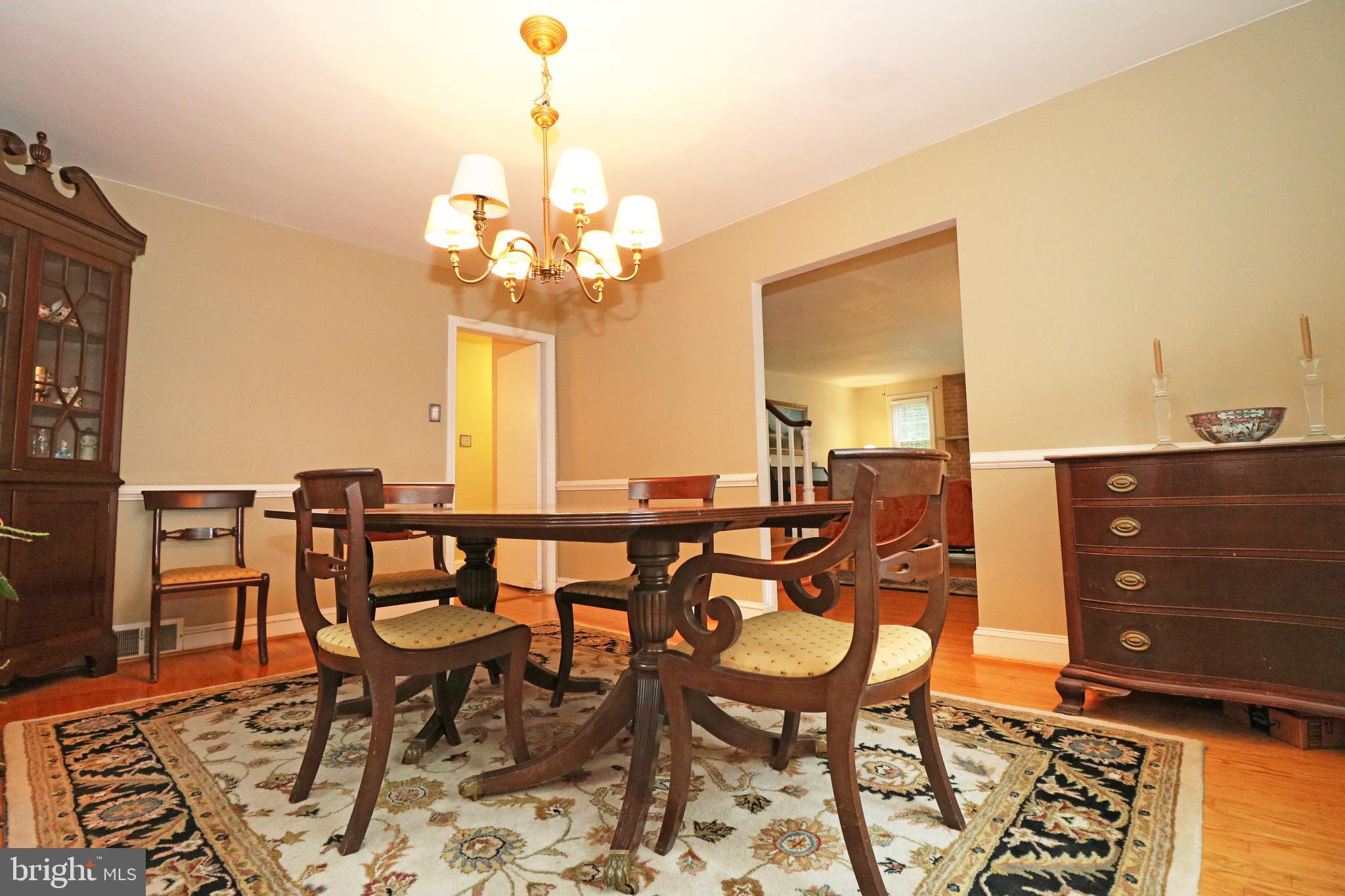 371 Southcroft Road Springfield, PA 19064 - Photo 6 of 42 a view of a dining room with furniture and chandelier