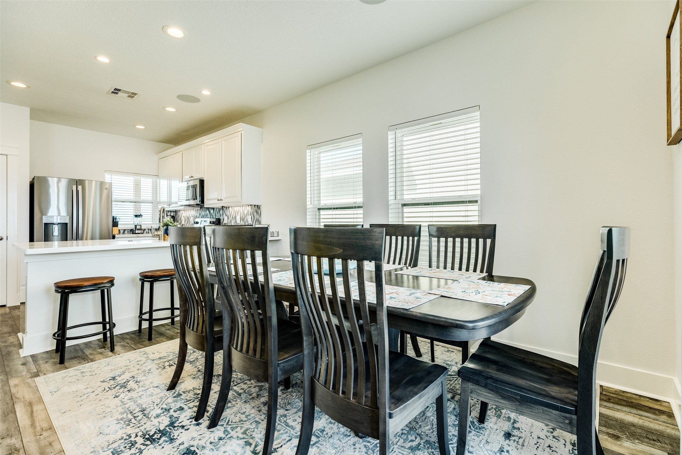 109 D Santar Loop Surfside Beach, TX 77541 - Photo 15 of 42 a view of a a dining room with furniture window and wooden floor