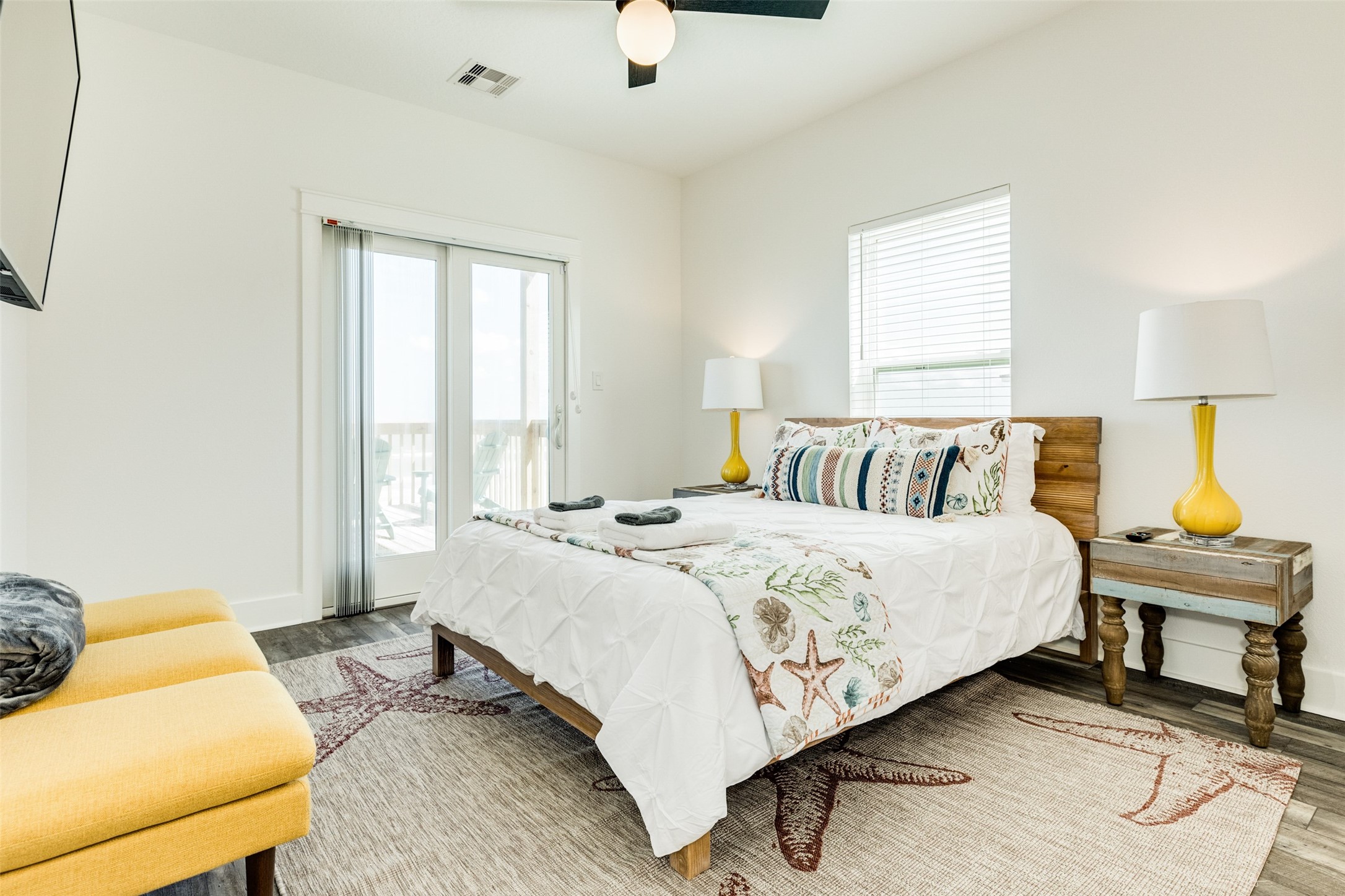 109 D Santar Loop Surfside Beach, TX 77541 - Photo 20 of 42 a bedroom with a bed and window