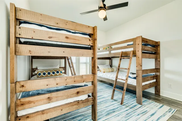 a aerial view of a house with a yard