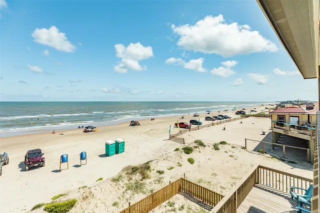 a view of kitchen island with wooden floor