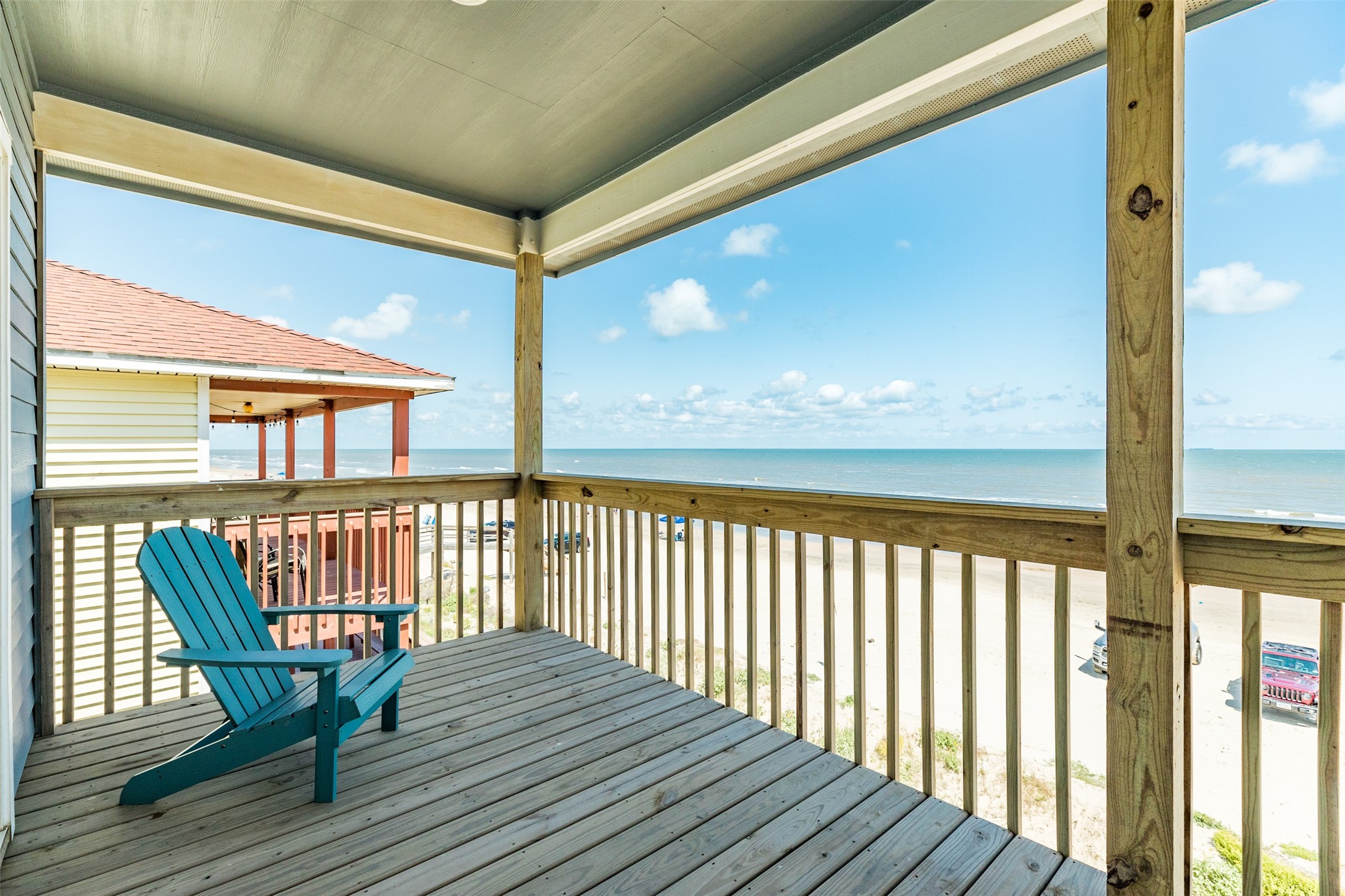 109 D Santar Loop Surfside Beach, TX 77541 - Photo 10 of 42 a view of balcony with wooden floor