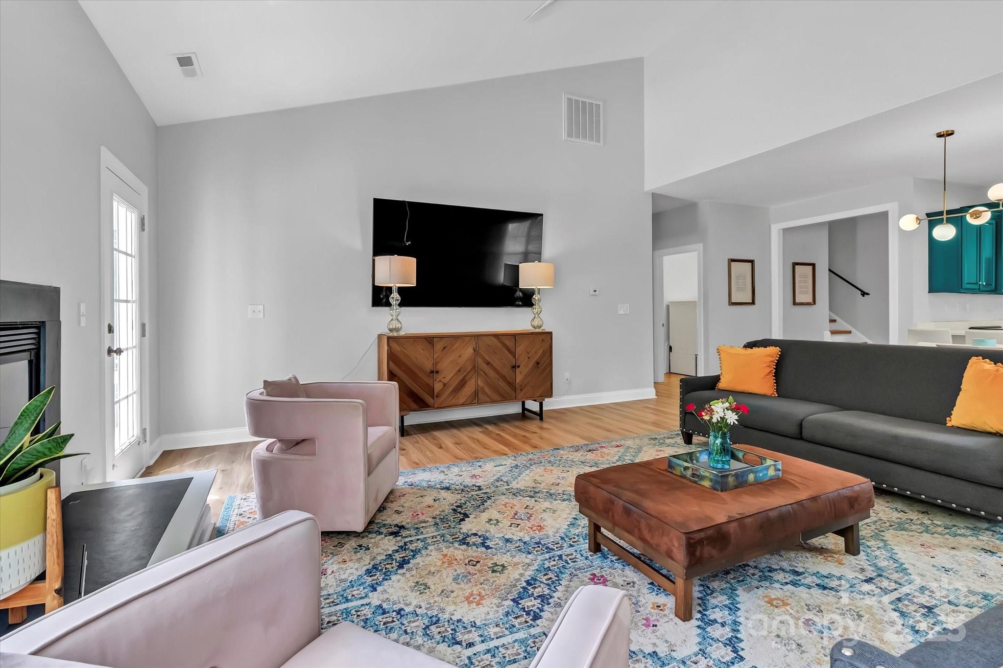 835 Ryans Place Fort Mill, SC 29715 - Photo 12 of 37 a living room with furniture and a flat screen tv