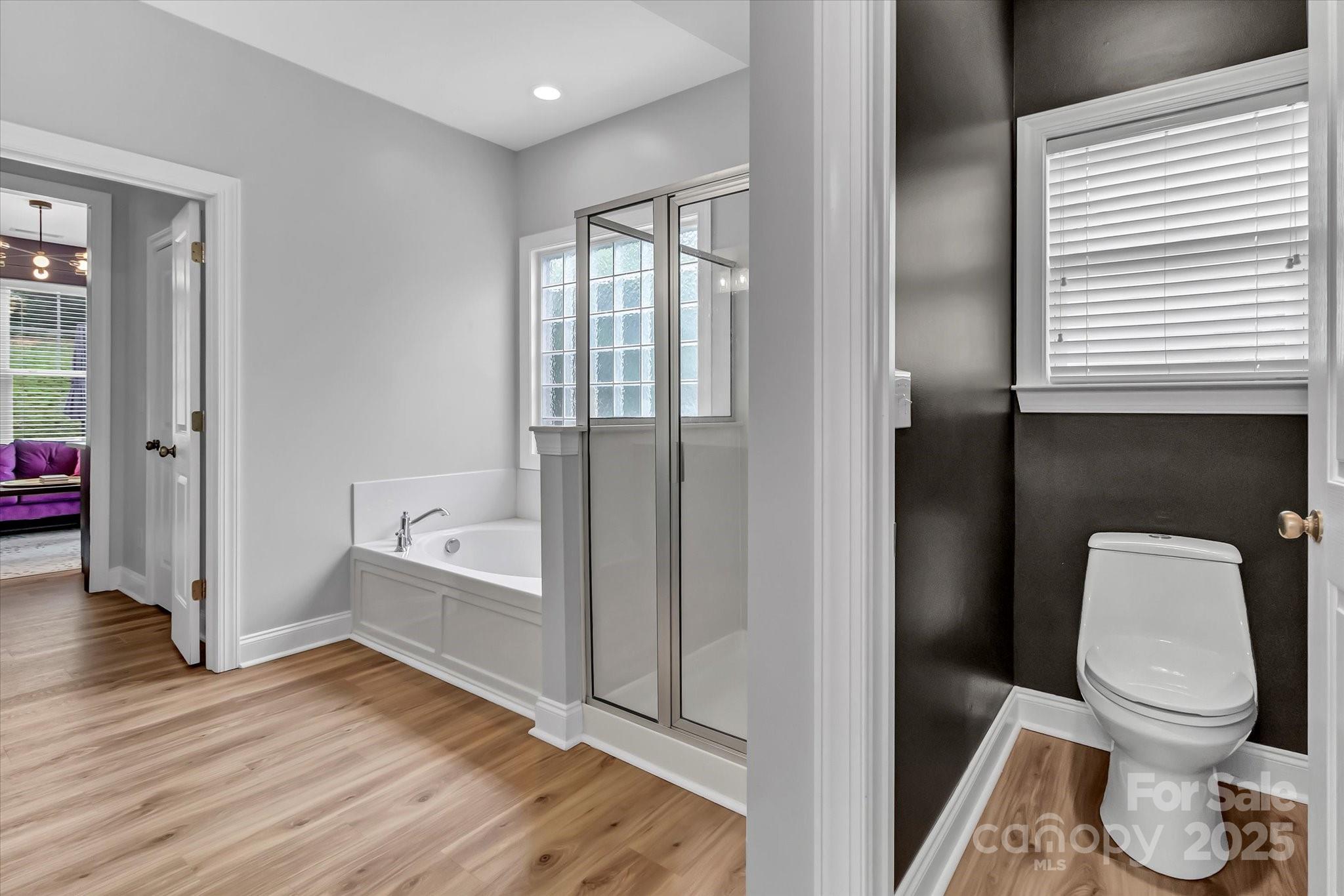 835 Ryans Place Fort Mill, SC 29715 - Photo 19 of 37 a bathroom with a toilet and a shower