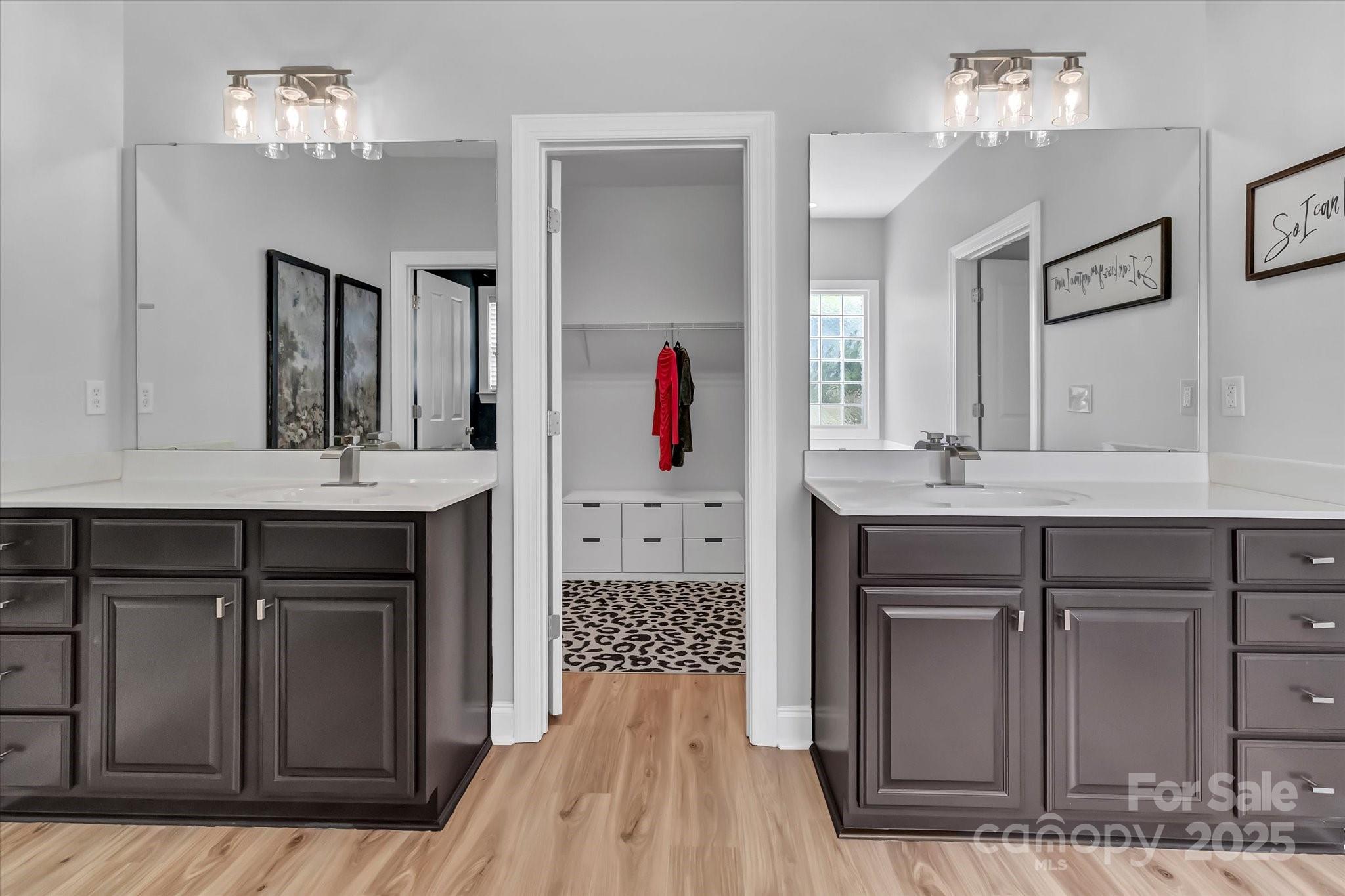 835 Ryans Place Fort Mill, SC 29715 - Photo 20 of 37 a bathroom with a sink and a mirror