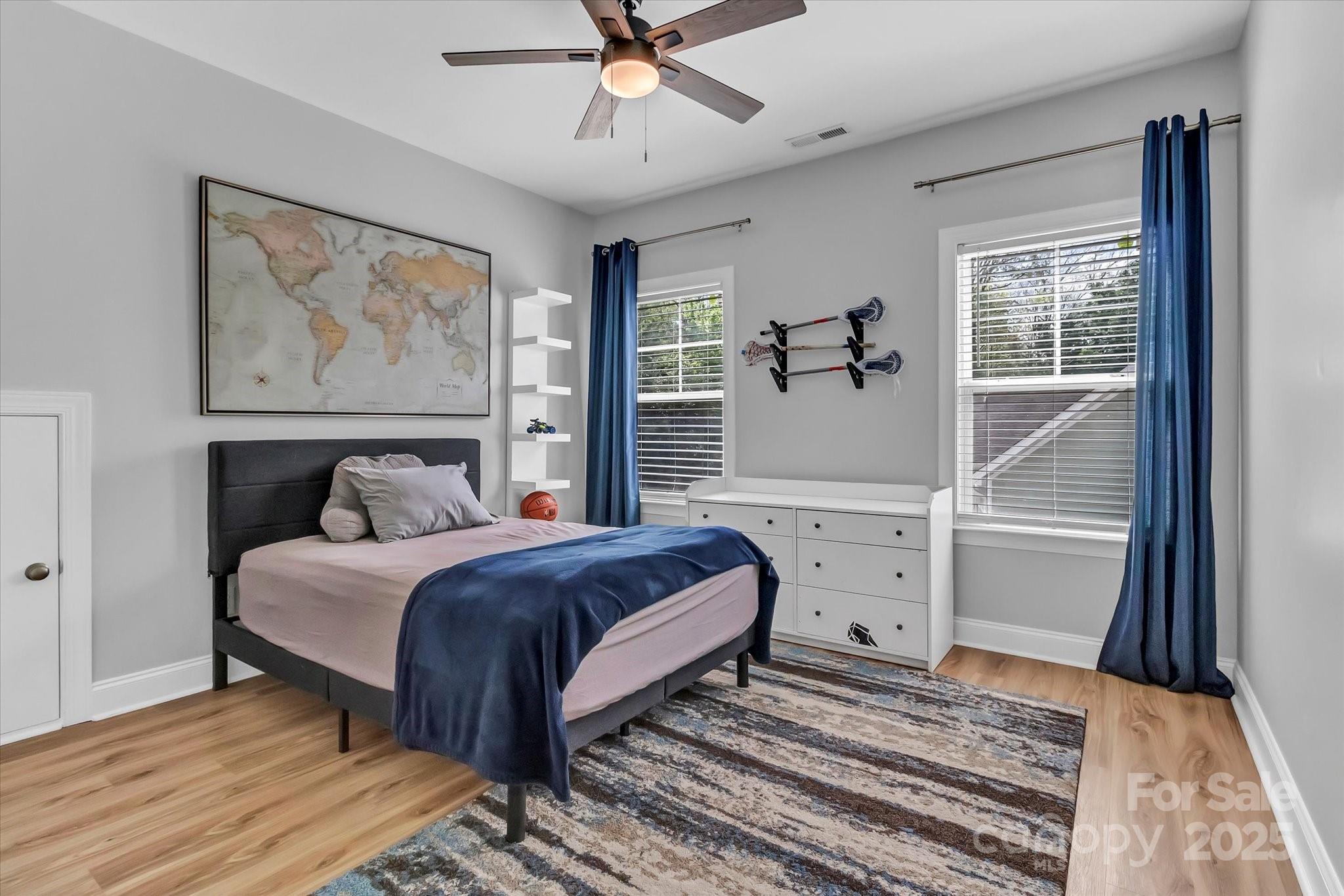 835 Ryans Place Fort Mill, SC 29715 - Photo 27 of 37 a bedroom with a large bed and a window
