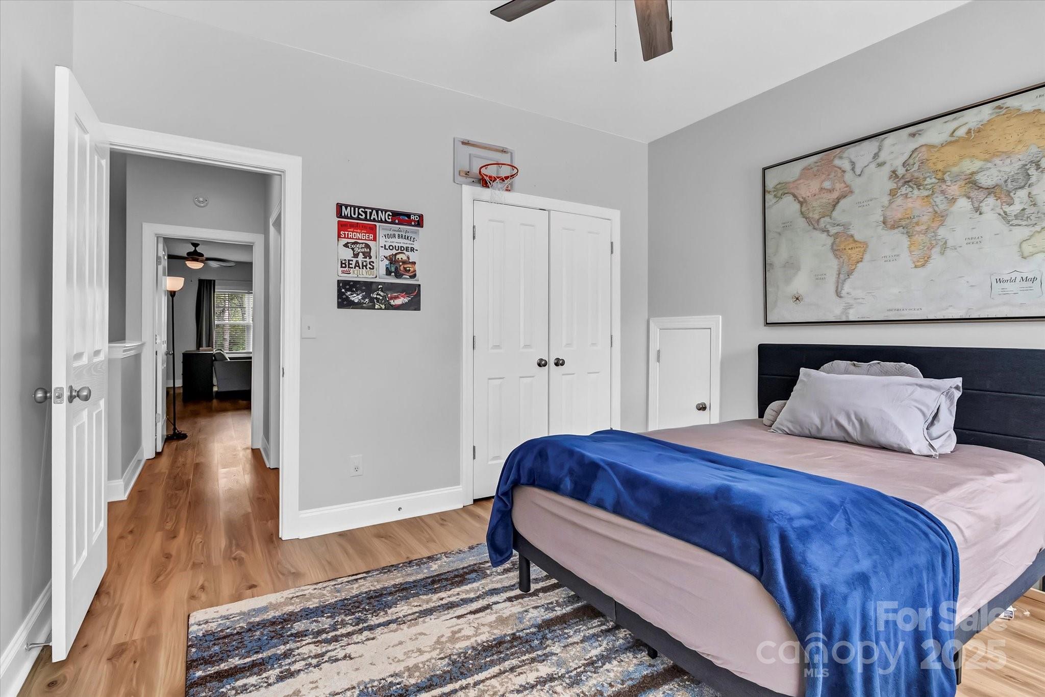 835 Ryans Place Fort Mill, SC 29715 - Photo 28 of 37 a bedroom with a bed and a painting on the wall