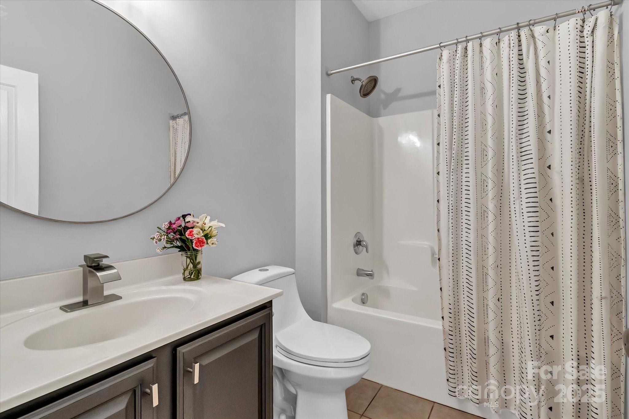 835 Ryans Place Fort Mill, SC 29715 - Photo 29 of 37 a bathroom with a sink toilet and shower