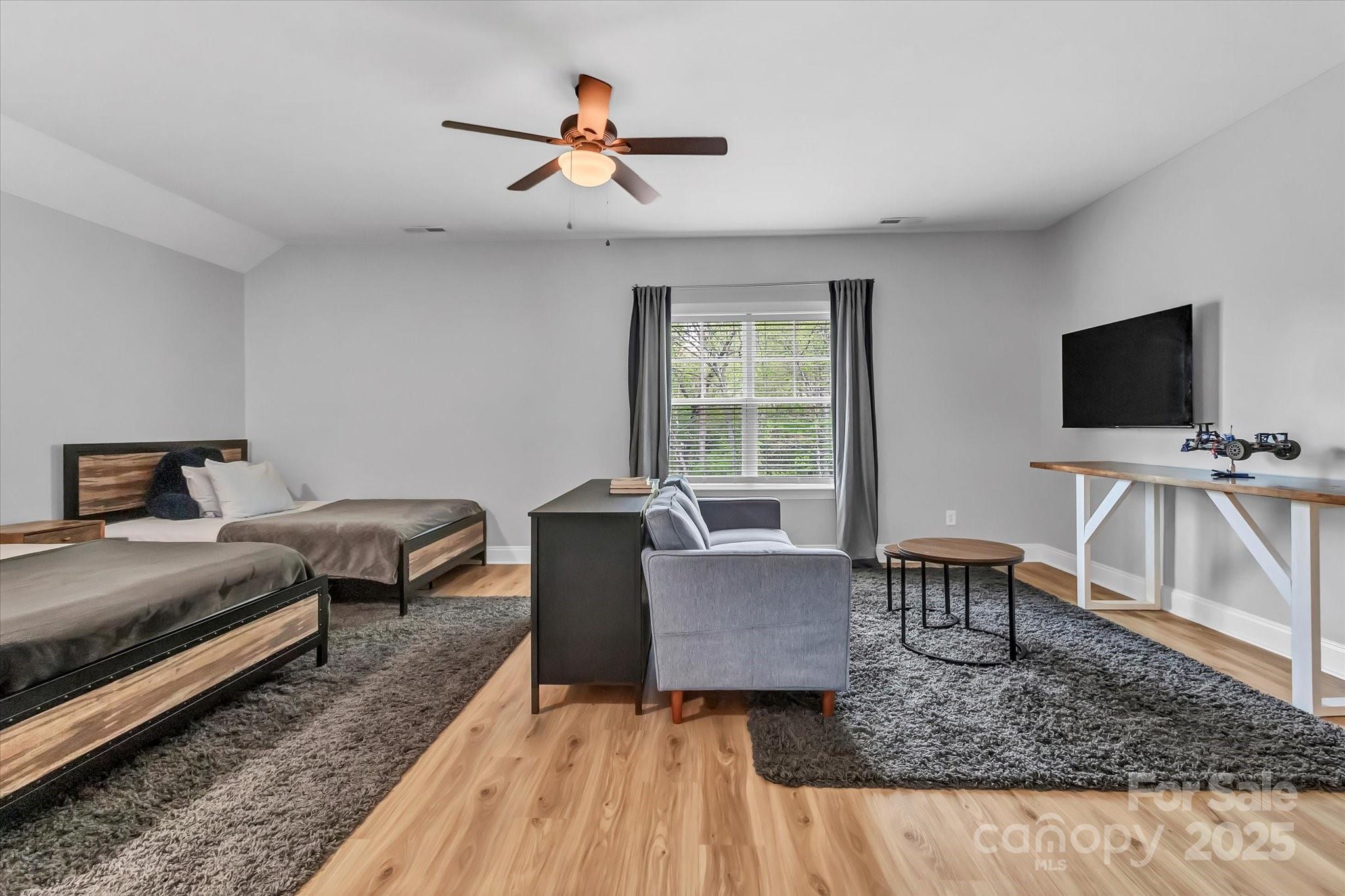 835 Ryans Place Fort Mill, SC 29715 - Photo 30 of 37 a living room with furniture and a flat screen tv