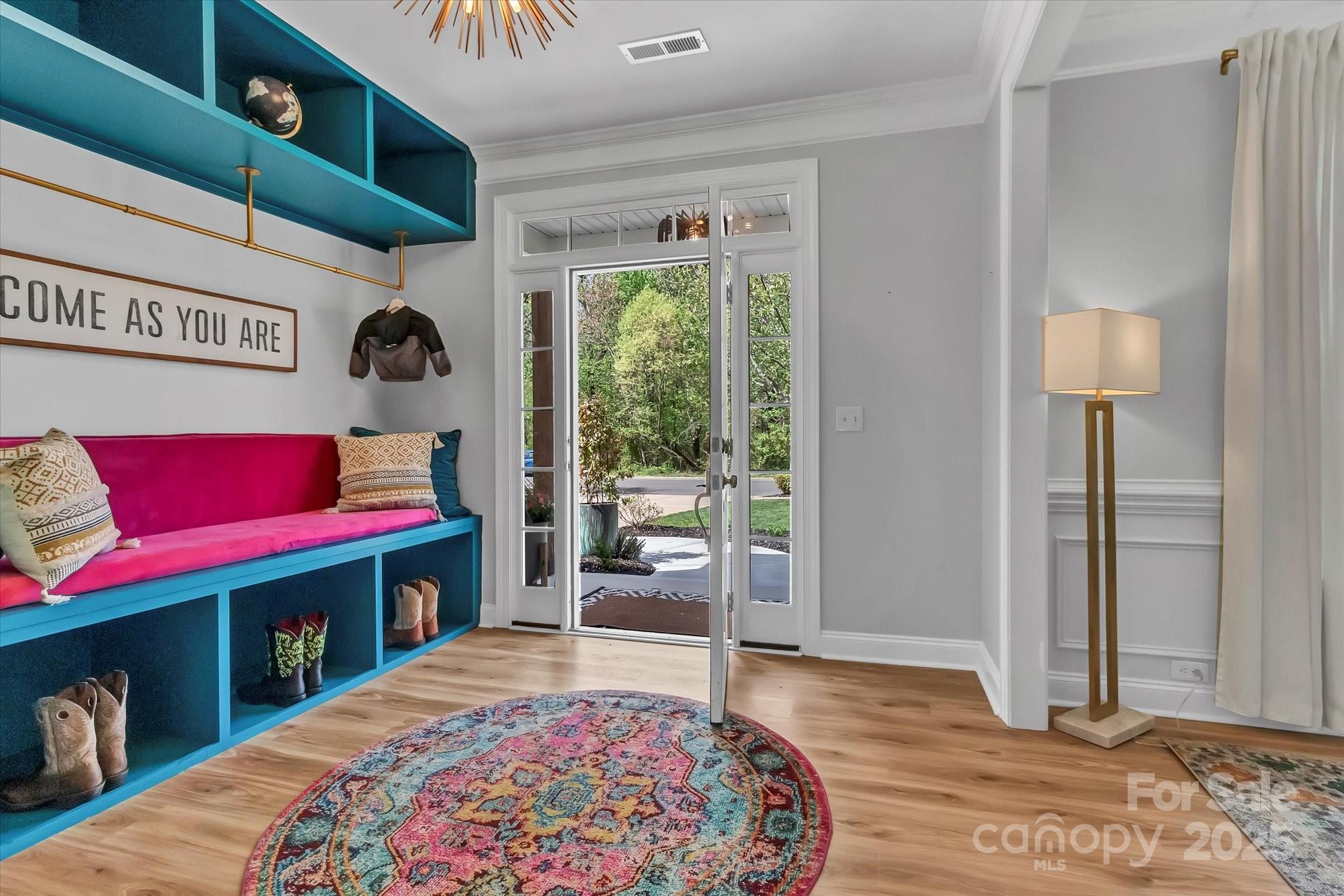 835 Ryans Place Fort Mill, SC 29715 - Photo 3 of 37 a living room with furniture and a gate