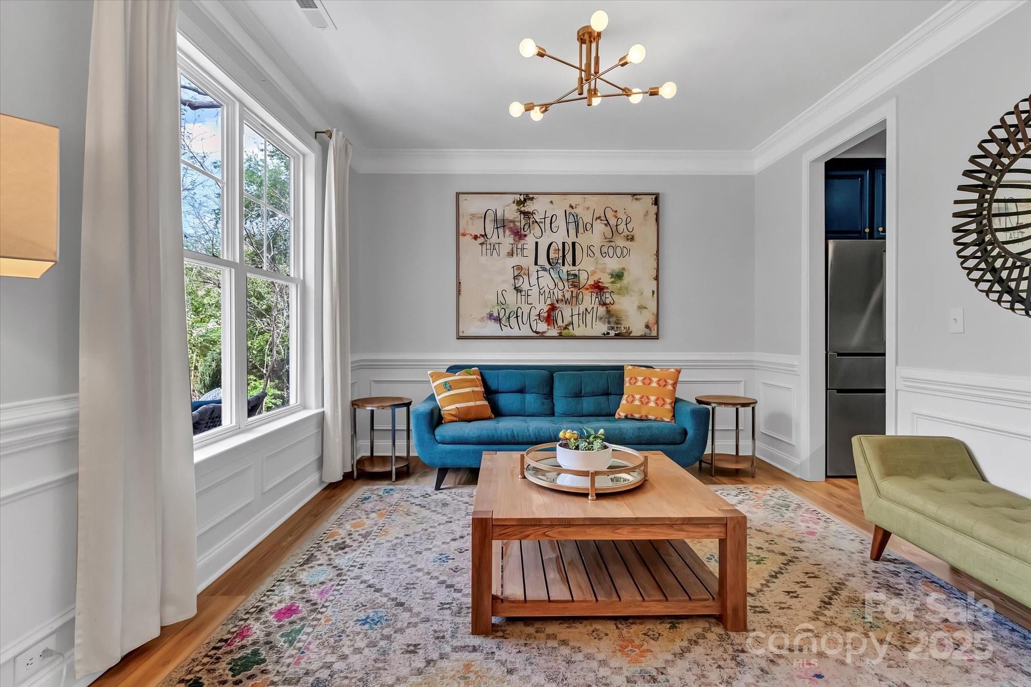 835 Ryans Place Fort Mill, SC 29715 - Photo 4 of 37 a living room with furniture and a large window