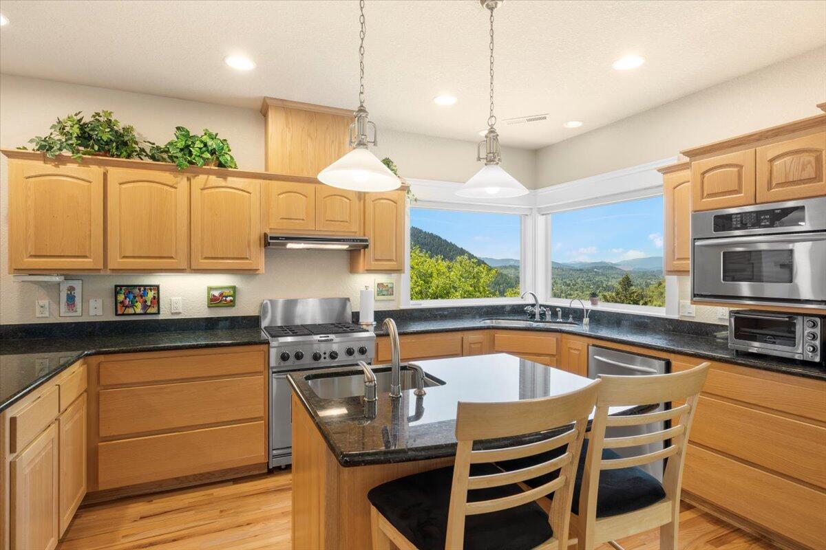 3344 Pearce Park Road Grants Pass, OR 97526 - Photo 24 of 65 Under cabinet lighting, picture perfect views from main kitchen sink.