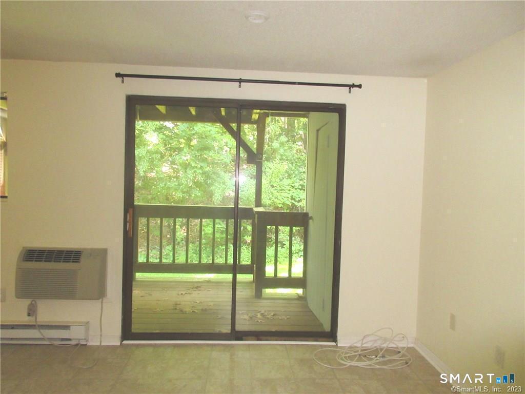 5 Nabby Road, Unit A17 Danbury, CT 06811 - Photo 2 of 11 a view of room with a large window