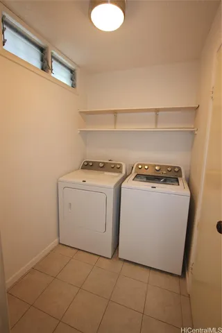 a bathroom with a sink toilet and mirror