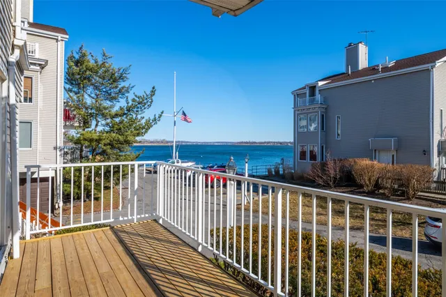 a view of balcony with furniture