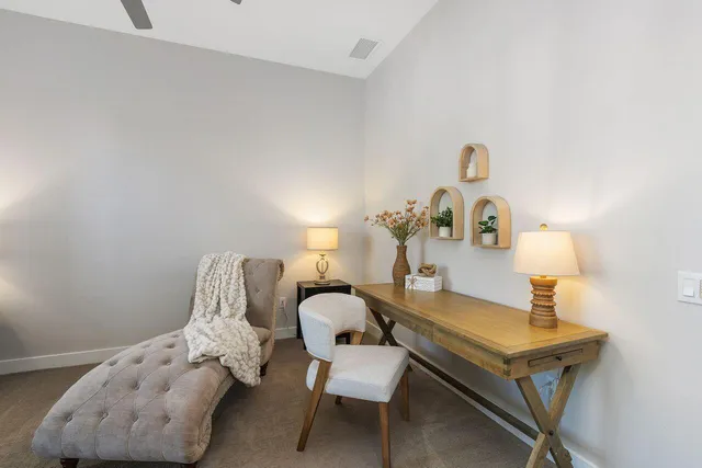 a room with furniture and wooden floor